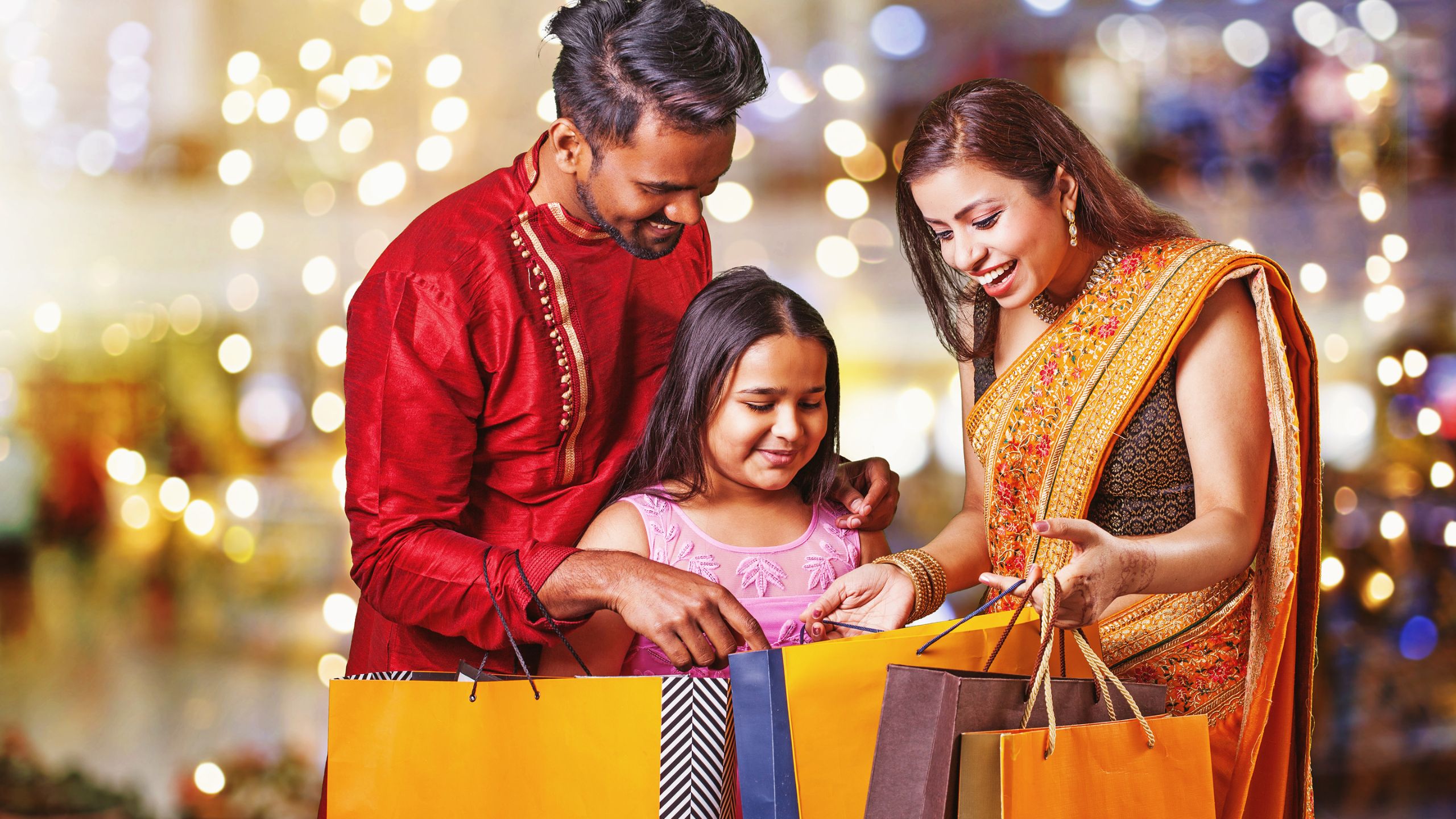 parents shopping with their daughter